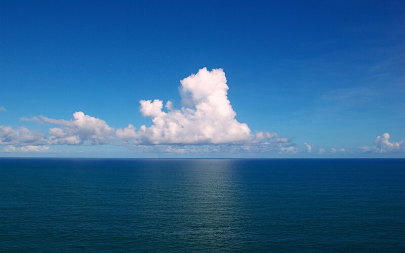 Ocean with Cumulus Clouds — Blue, Serene