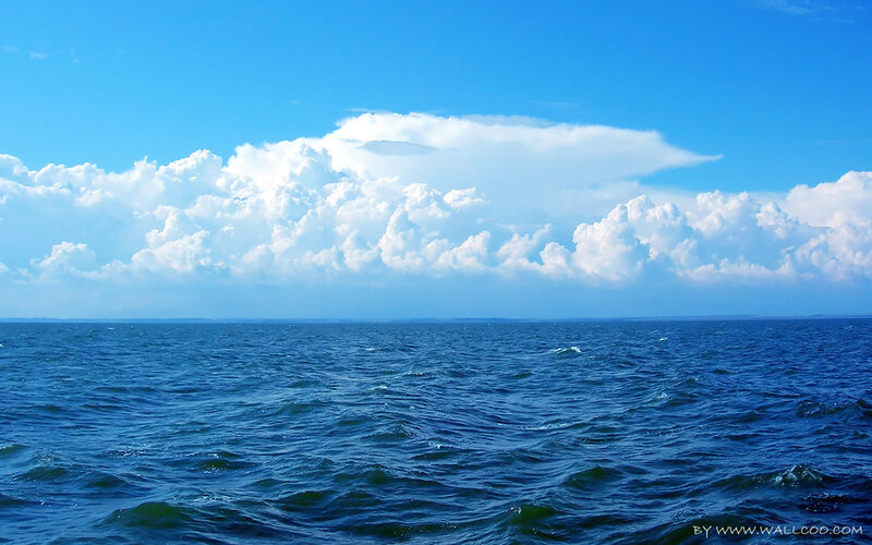 Ocean with Cumulus Clouds — Blue