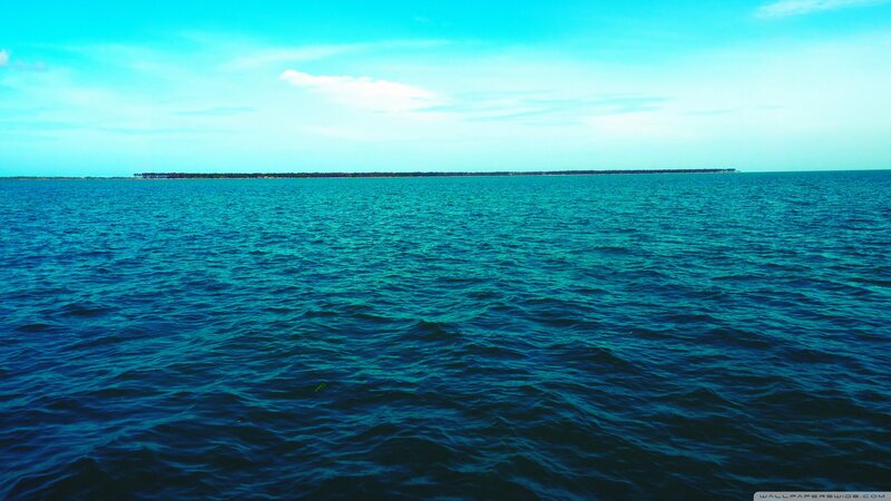 Ocean with Distant Island — Blue, Serene