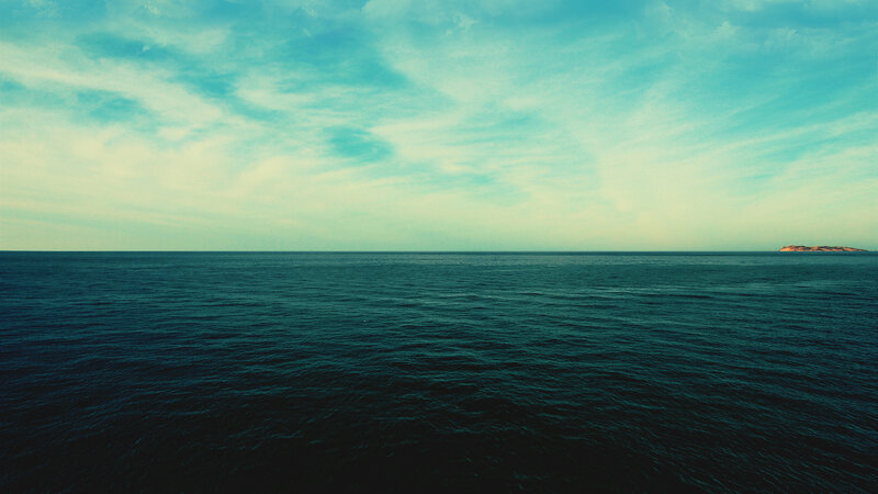 Ocean with Distant Island