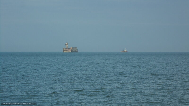 Ocean with distant structures