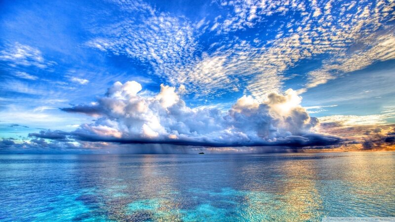 Ocean with Storm Clouds — Sunset