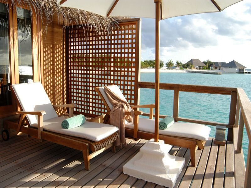 Oceanfront deck with lounge chairs