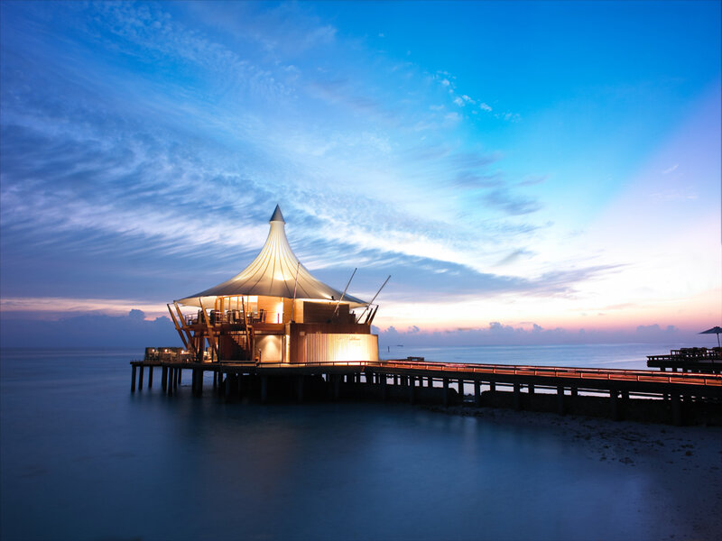 Oceanfront pavilion at dusk