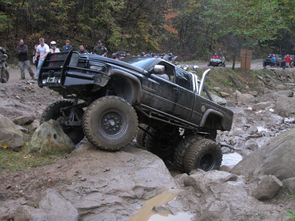 Off-road truck climbing rocks