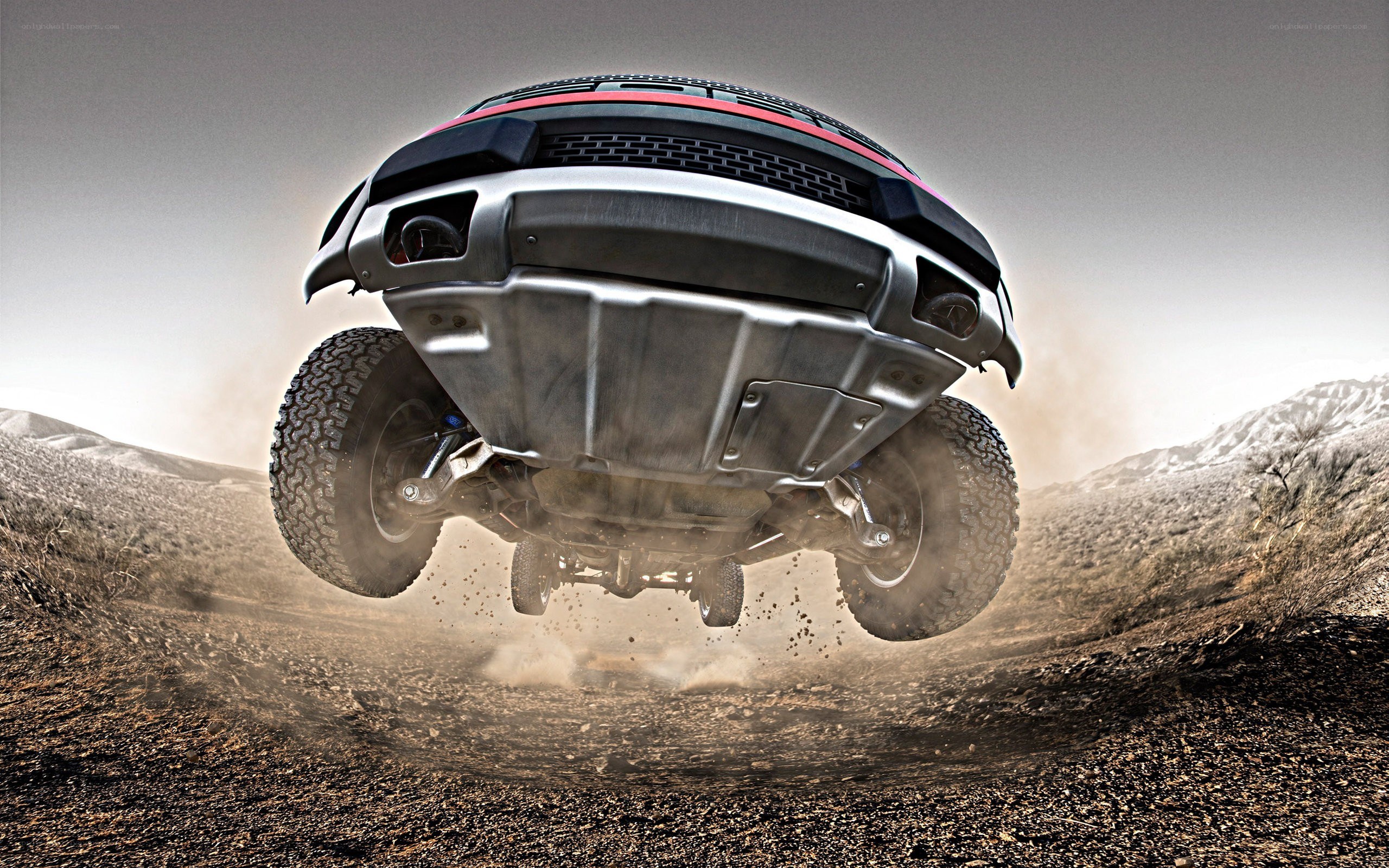 Off-road truck in mid-air jump