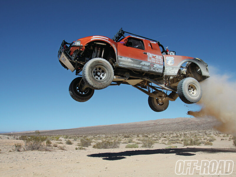 Off-road Truck in Mid-air — Orange