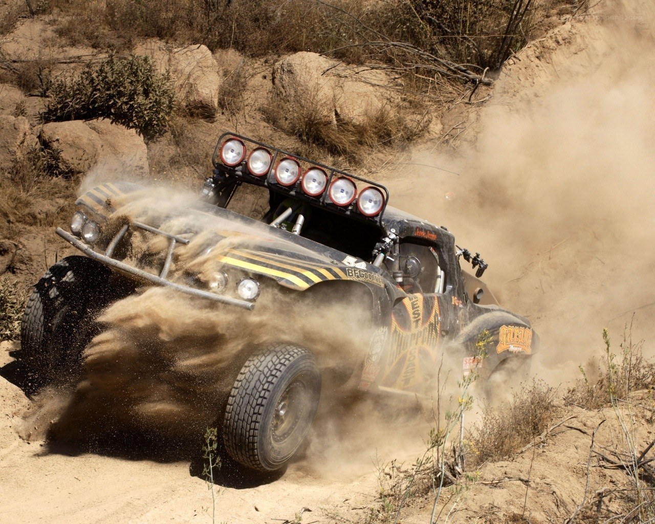 Off-road truck racing in desert