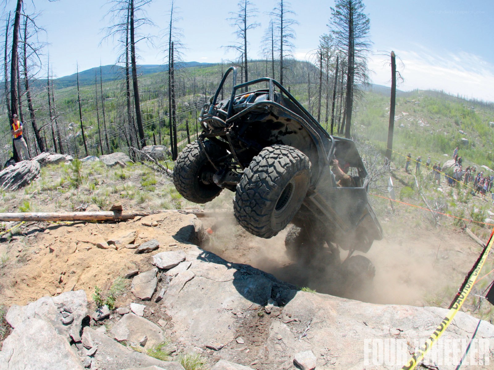 Off-road vehicle climbing hill