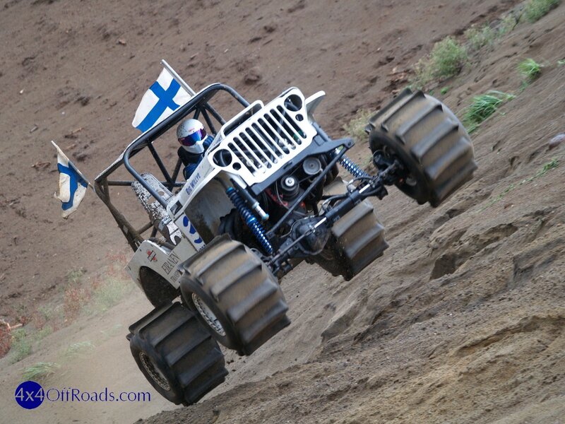 Off-road vehicle climbing hill