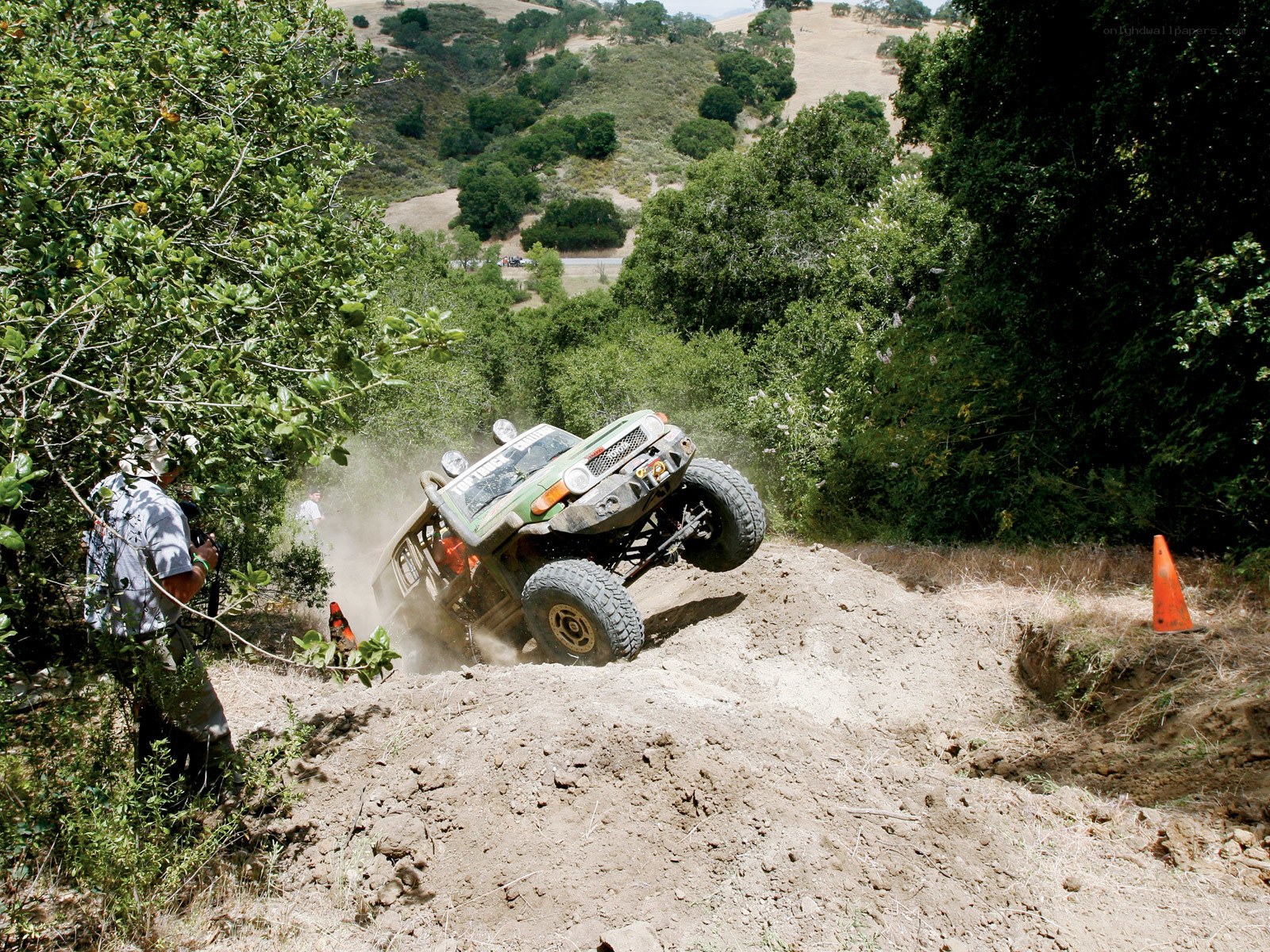 Off-road vehicle climbing hill