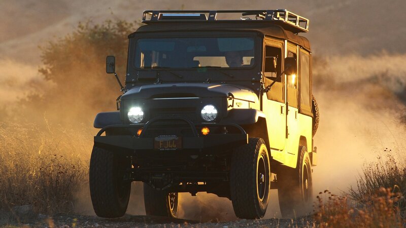 off-road vehicle in dusty terrain