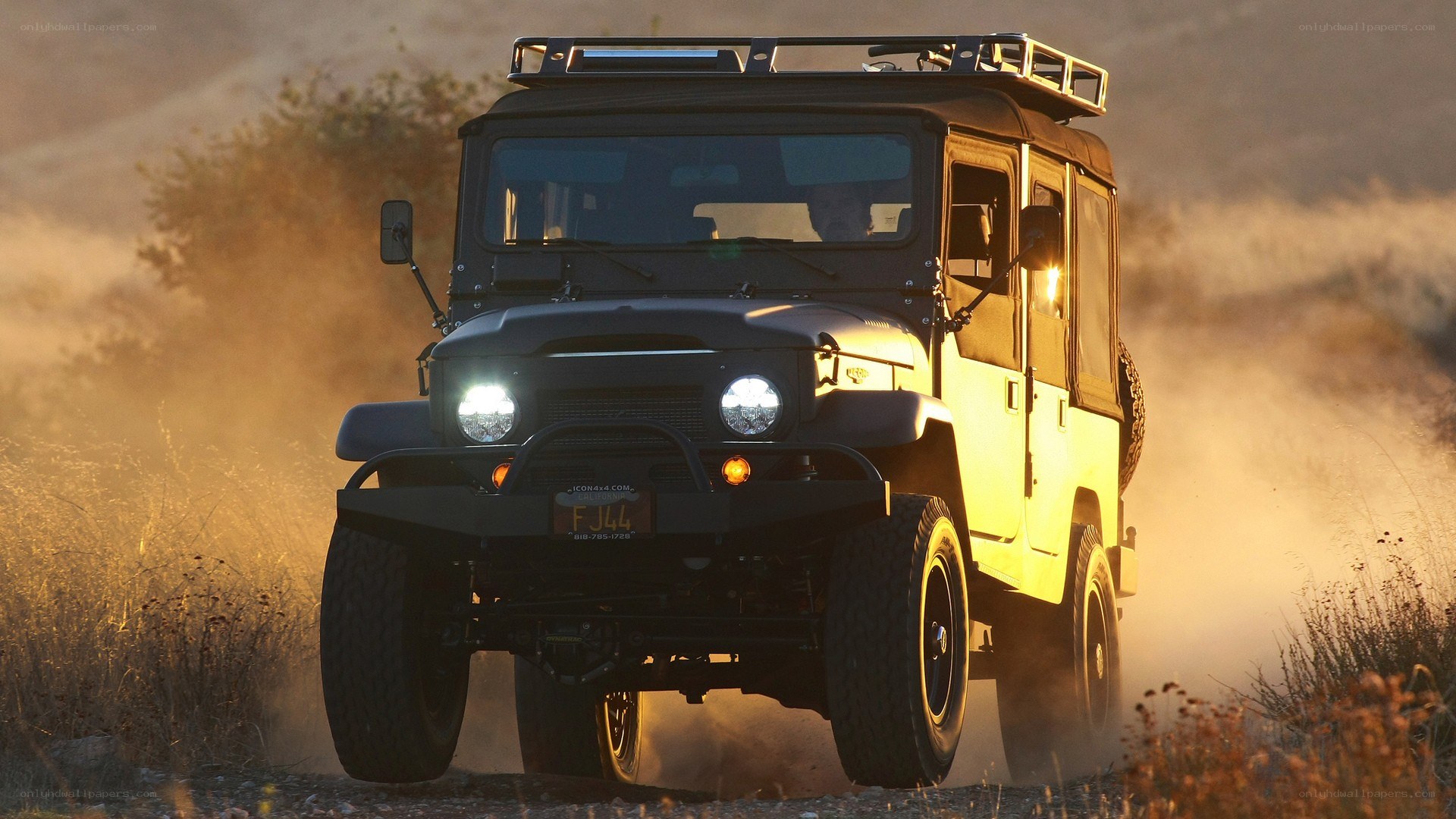 off-road vehicle in dusty terrain