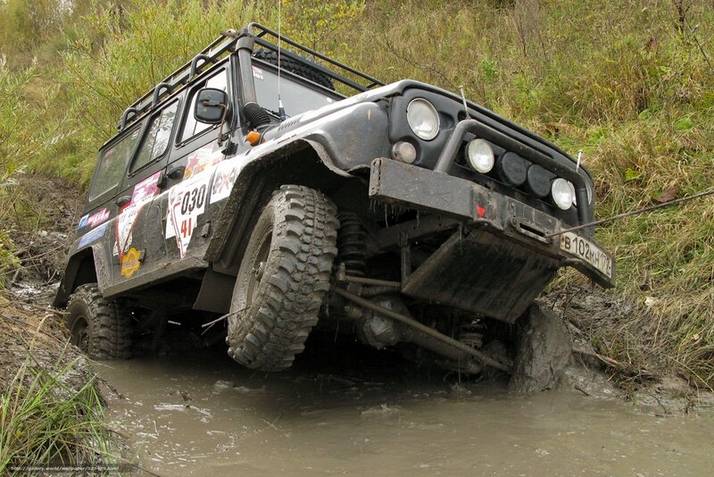 Off-road vehicle in mud