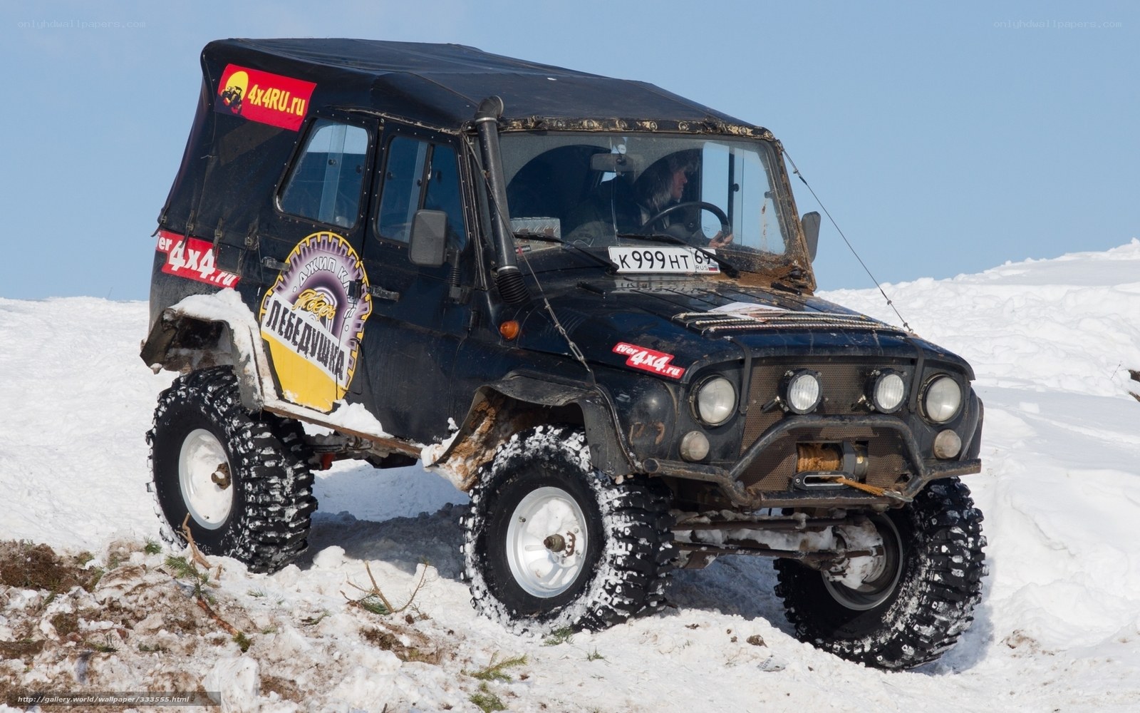 Off-road vehicle in snow