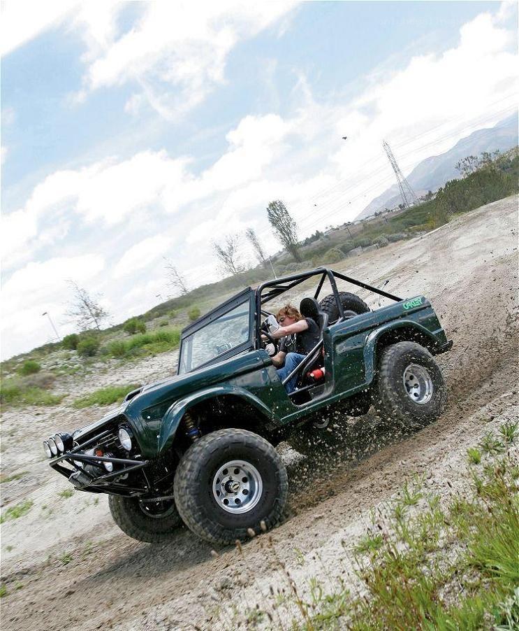 Off-road vehicle on a dirt hill