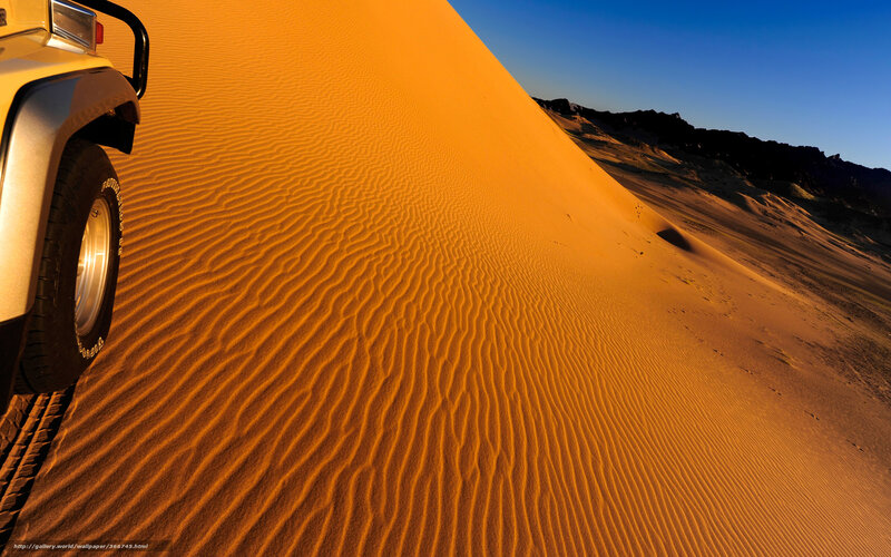 Off-road Vehicle on Sand Dune
