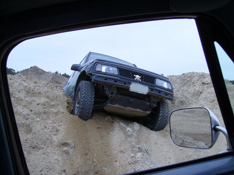 Off-road vehicle stuck in dirt