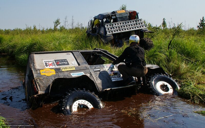 Off-road vehicles in swamp