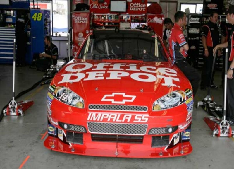 Office Depot race car in garage