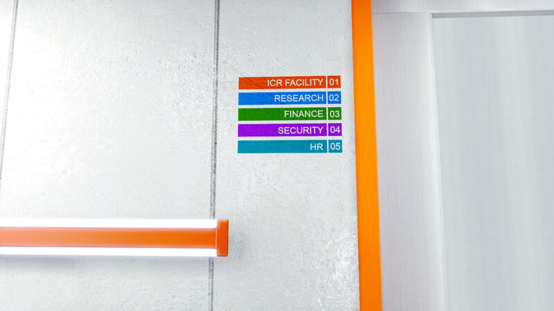 Office hallway with department signs