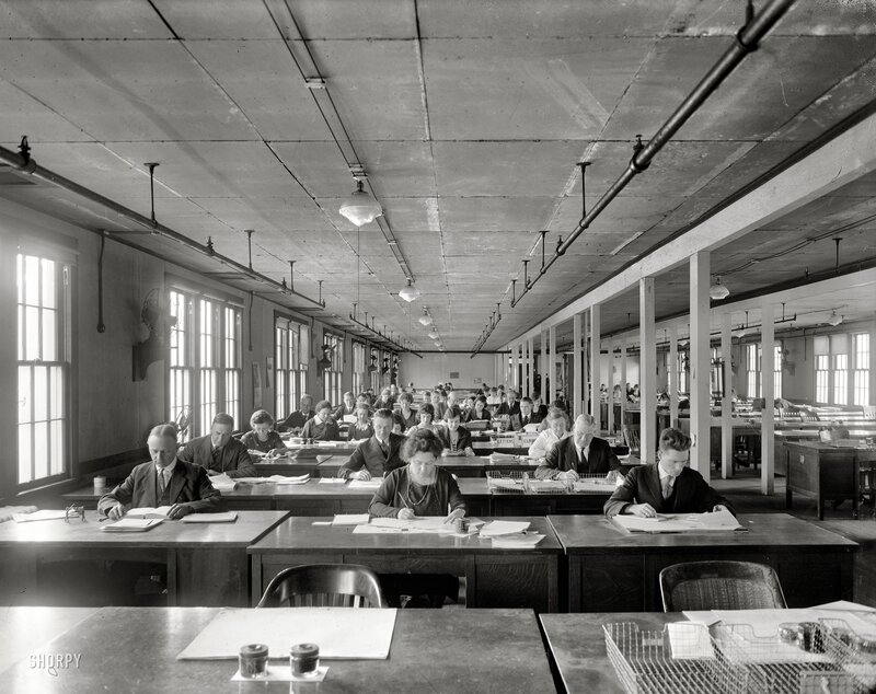 Office workers in a large room