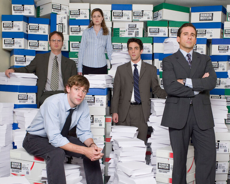 Office Workers Surrounded by Paper