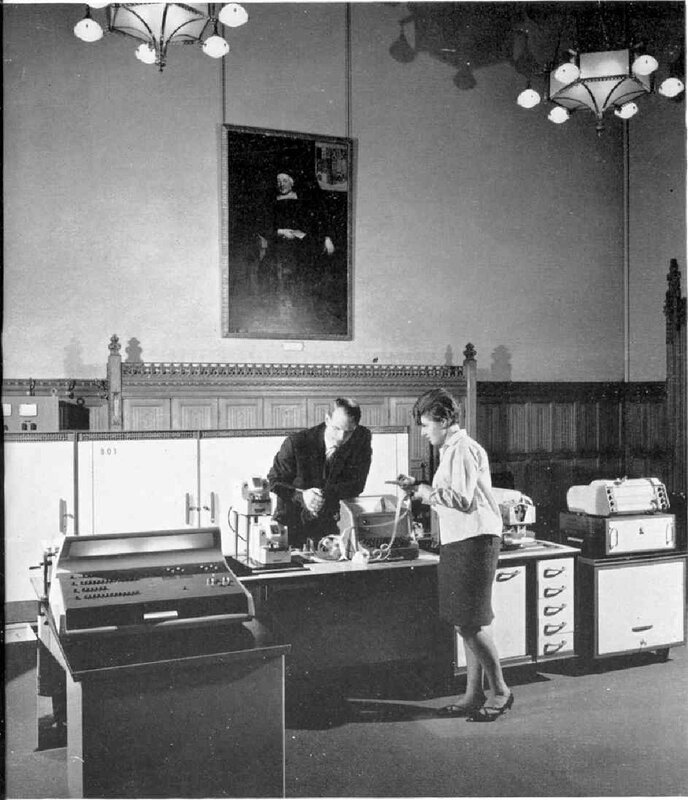 Office workers with early computers