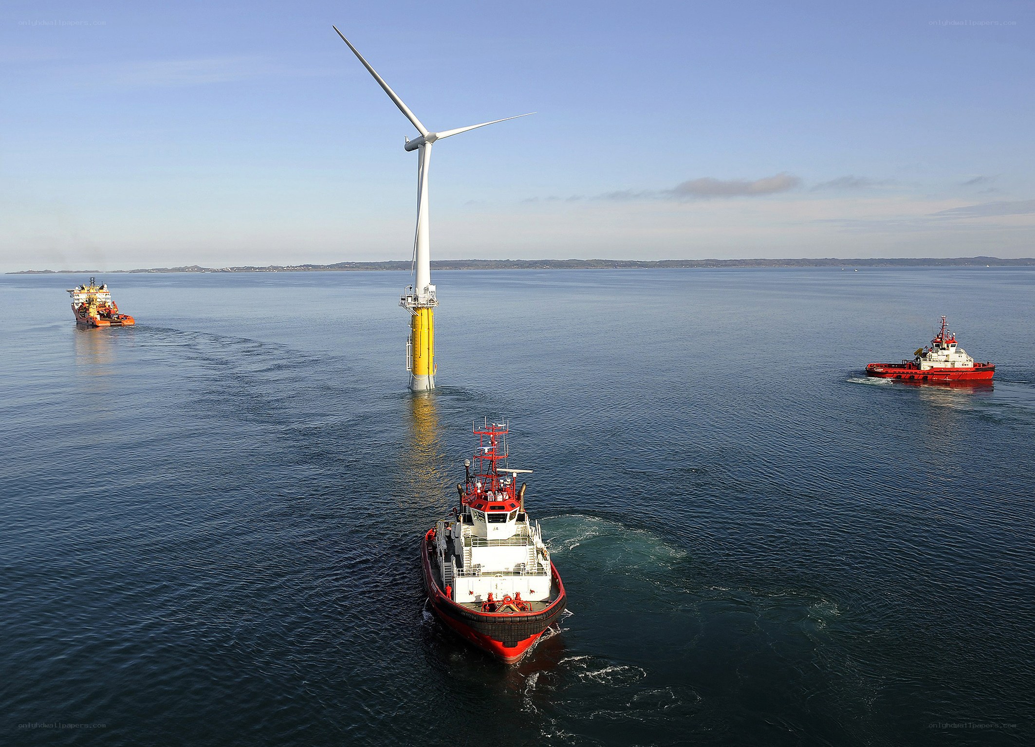 Offshore wind turbine with support vessels