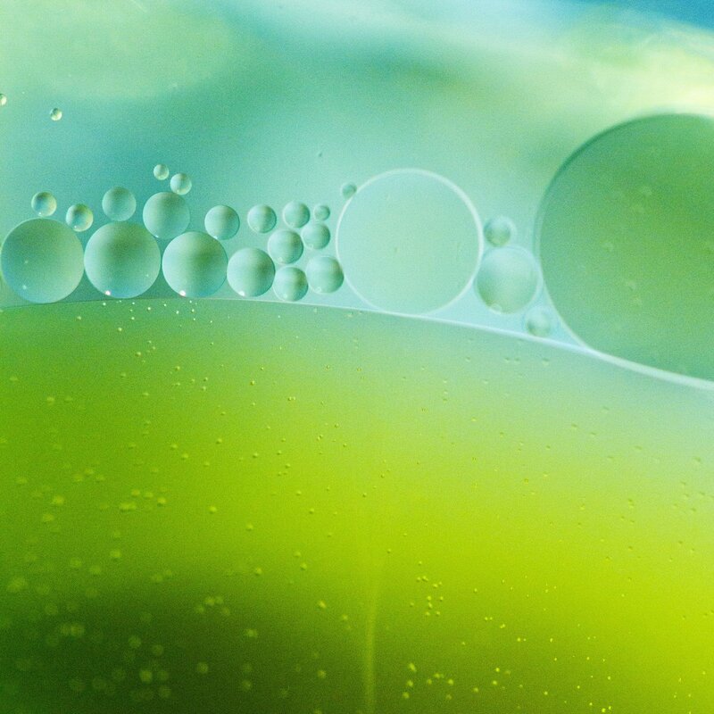 Oil Bubbles in Liquid — Green, Calm