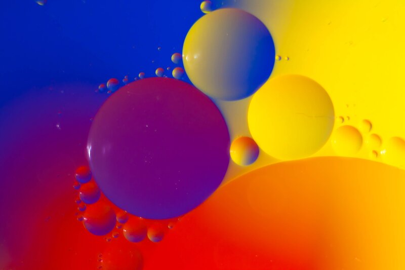 Oil Bubbles in Water — Blue, Vibrant