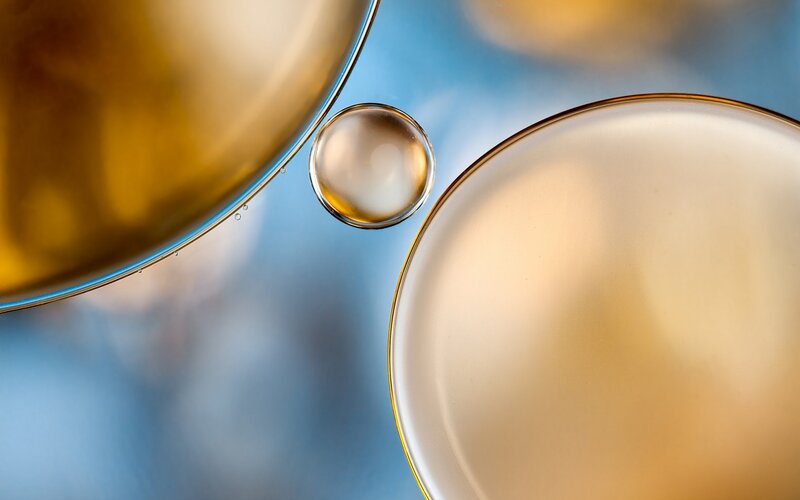 Oil Droplets on Water — Blue