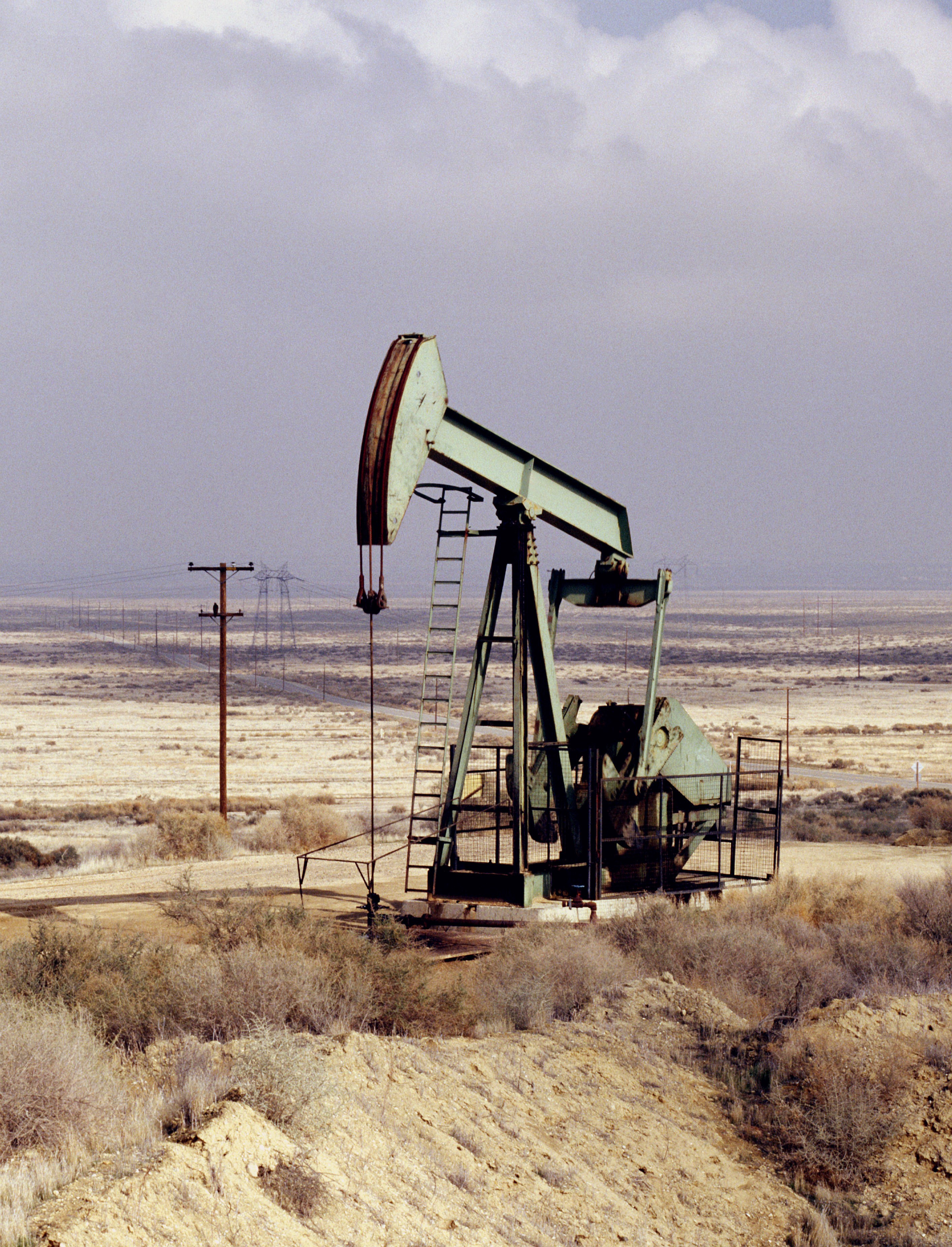 Oil pump in desert landscape