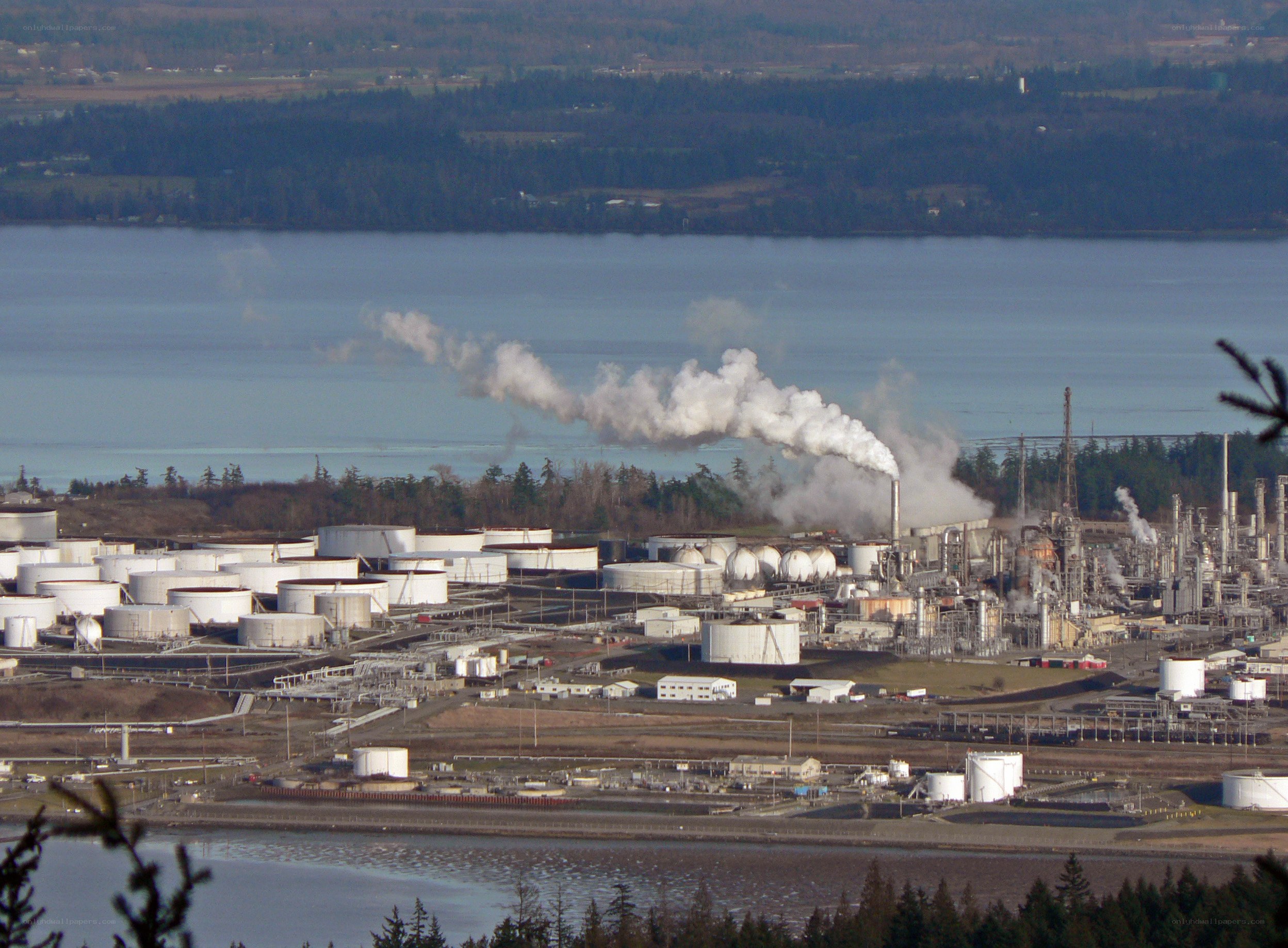 oil refinery by the water