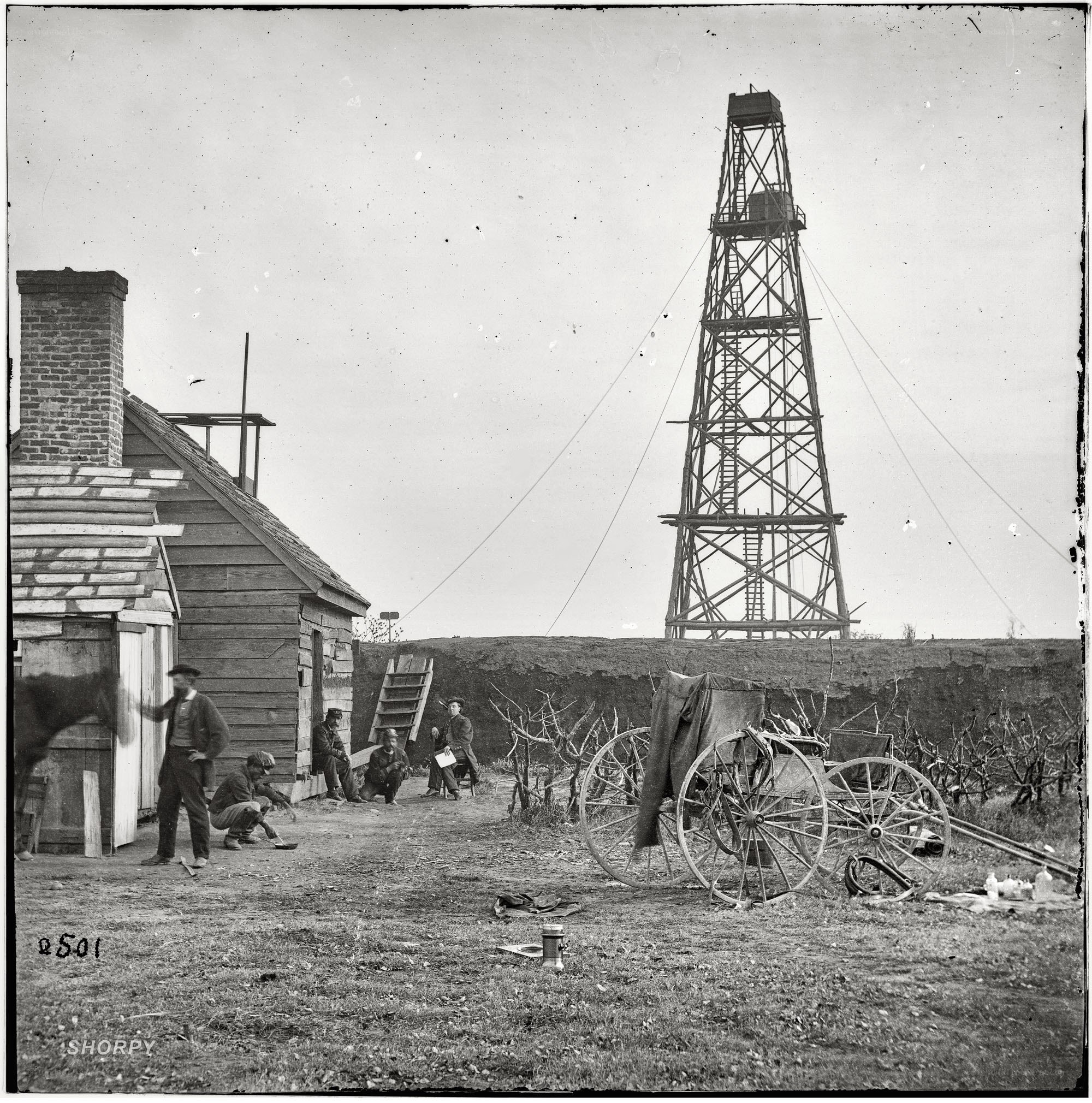 Oil rig and workers at site