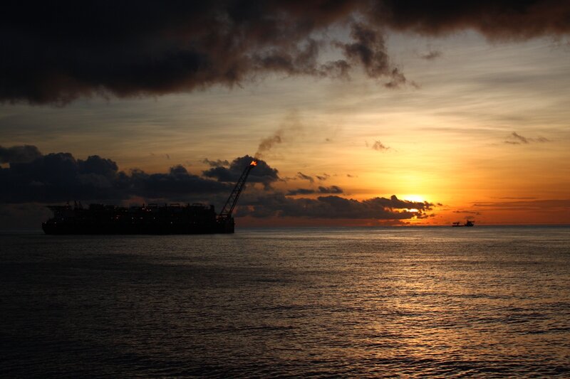 Oil rig at sunset
