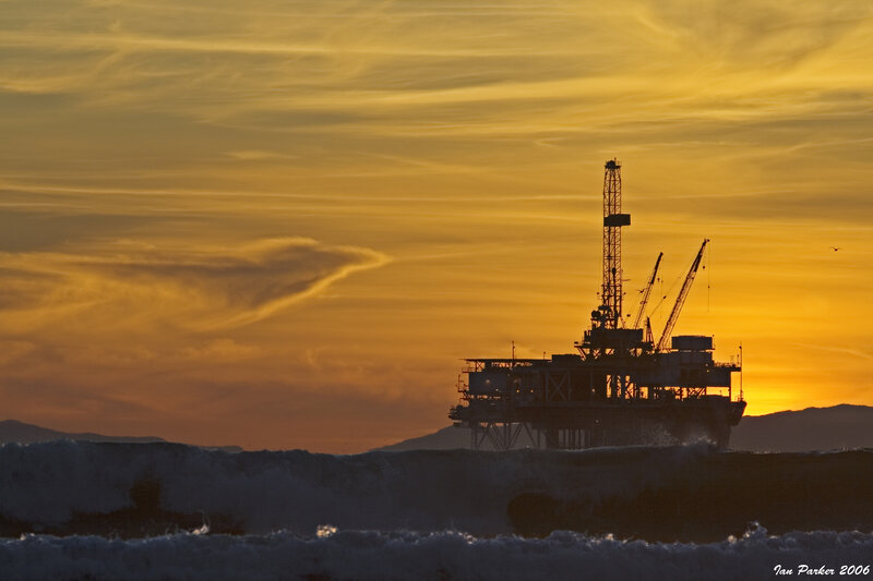 Oil rig at sunset