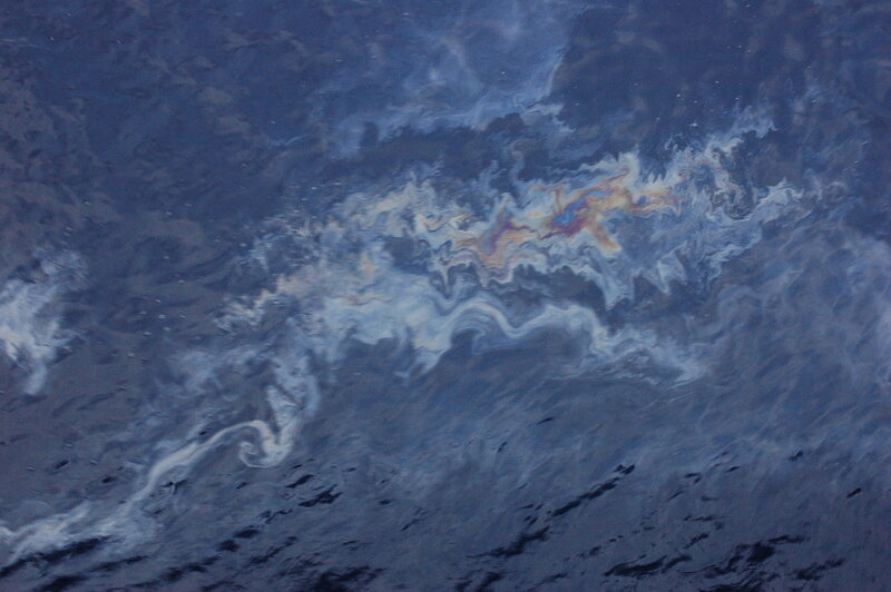 Oil slick on ocean surface