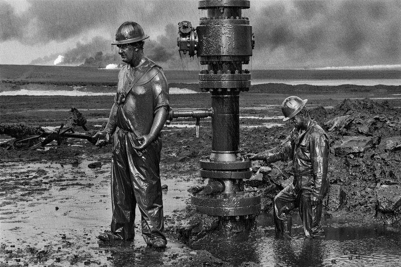 Oil workers at a drilling site
