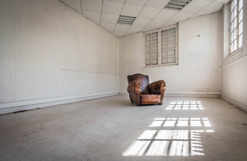 Old Armchair in Empty Room