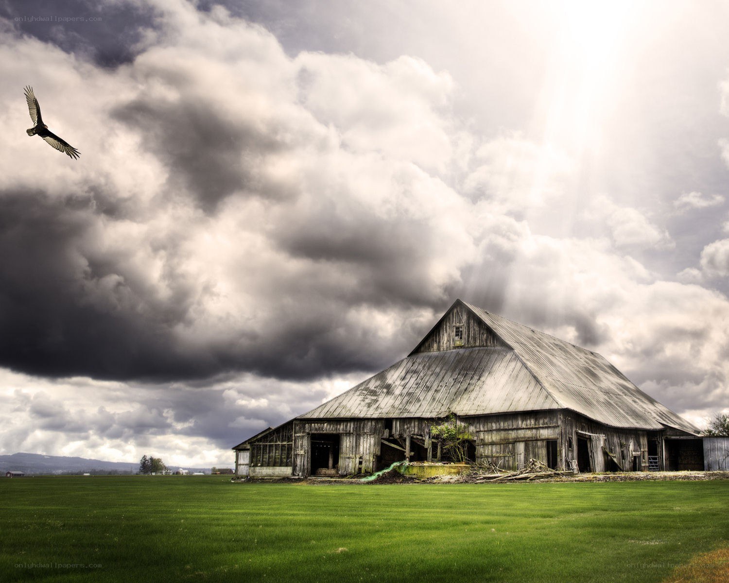 Old barn under stormy sky