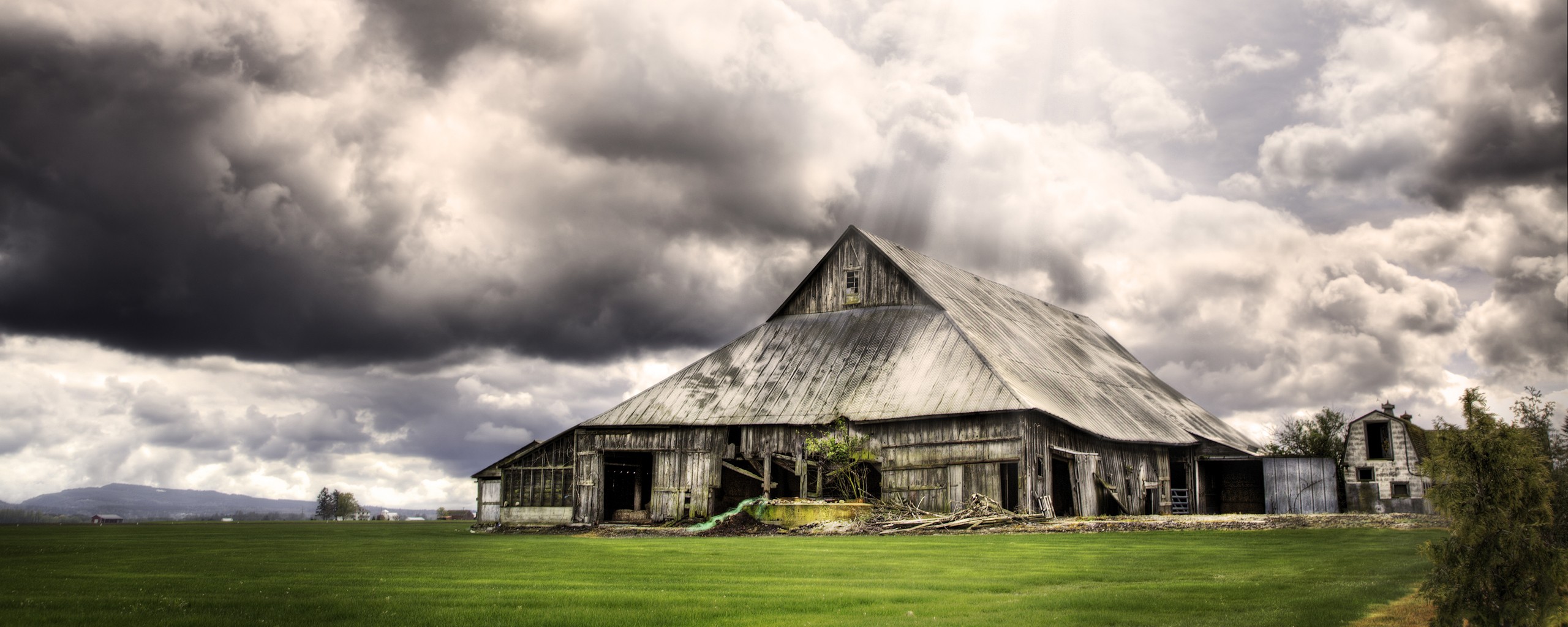 Old barn under stormy sky