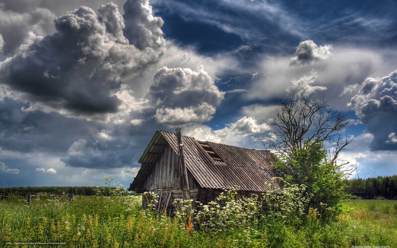 Old barn under stormy sky