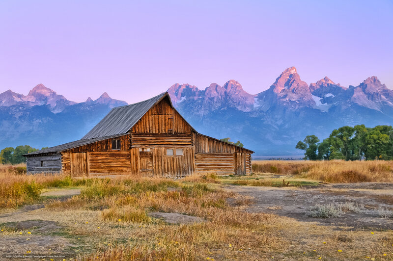 Old barn with mountain backdrop