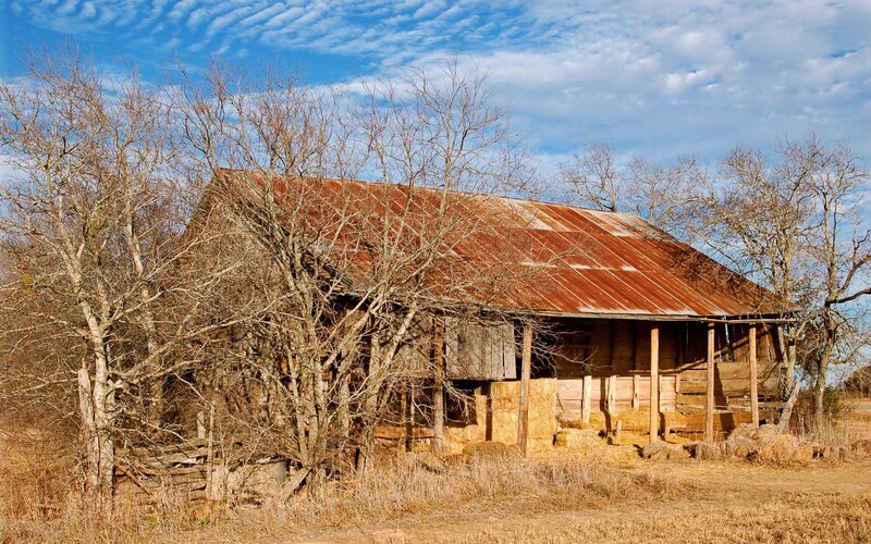 Old barn with rusty roof