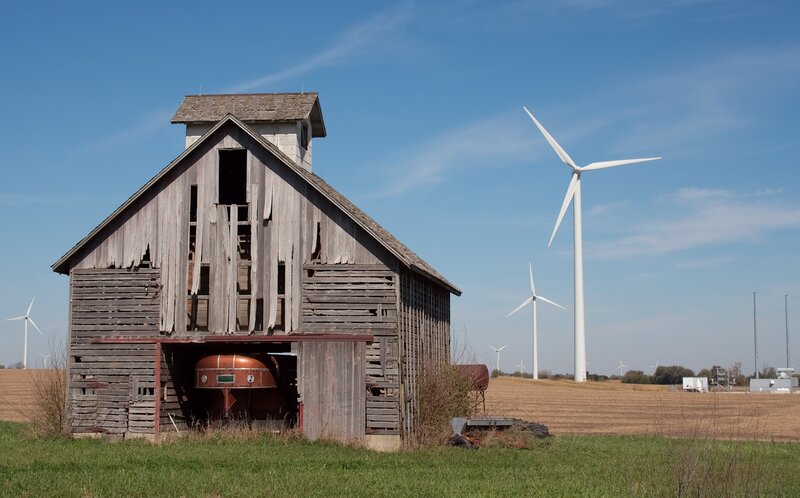 Old barn with wind turbines