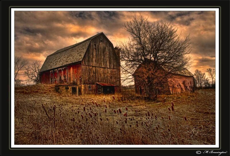 Old barns at sunset
