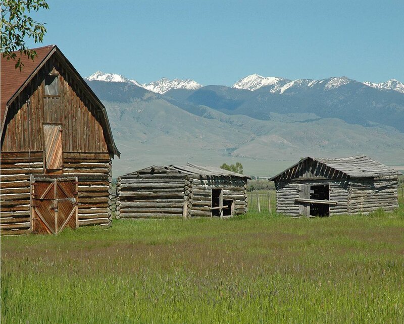 Old barns with mountain view