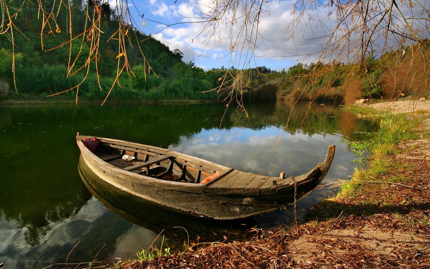 Old boat on a calm river