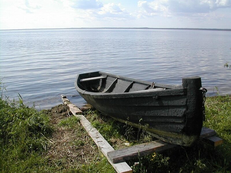 Old boat on a lakeshore